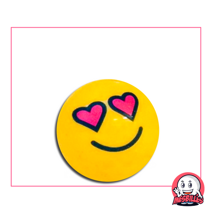 Yellow Marble depicting a face with pink heart-shaped eyes and a gentle smile
