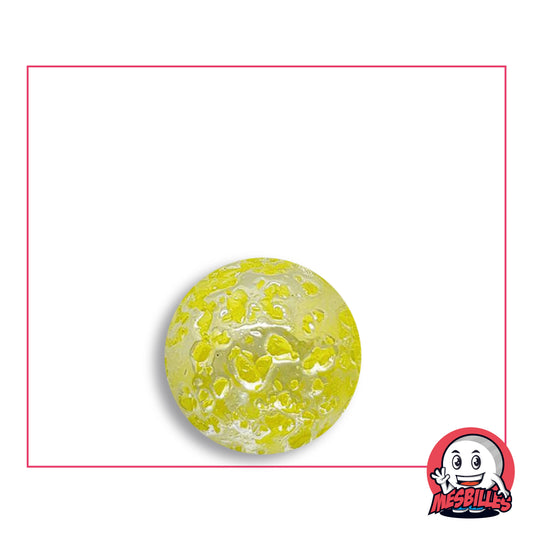 Pépite Yellow marble 16 mm in translucent colourless glass with lemon yellow flecks, top view, 16 mm in diameter