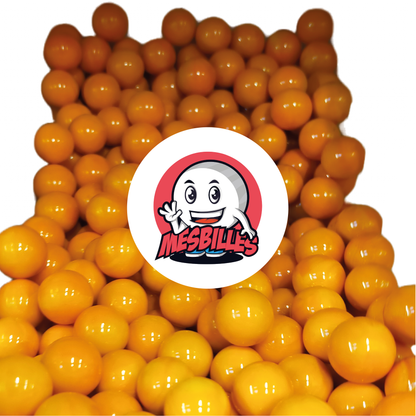 Image of the My-Glassmarbles Mascot surrounded by 25 mm Pearl Marbles - Vibrant Orange Opaque Glass