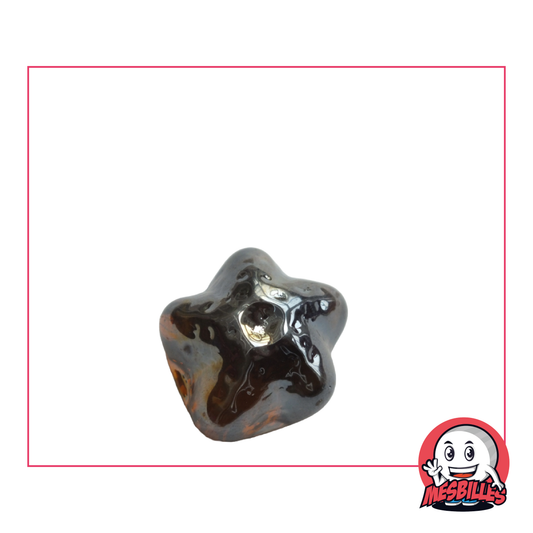 Photo of a translucent Night Amber coloured Marble Star, flat shape, measuring approximately 30 mm.