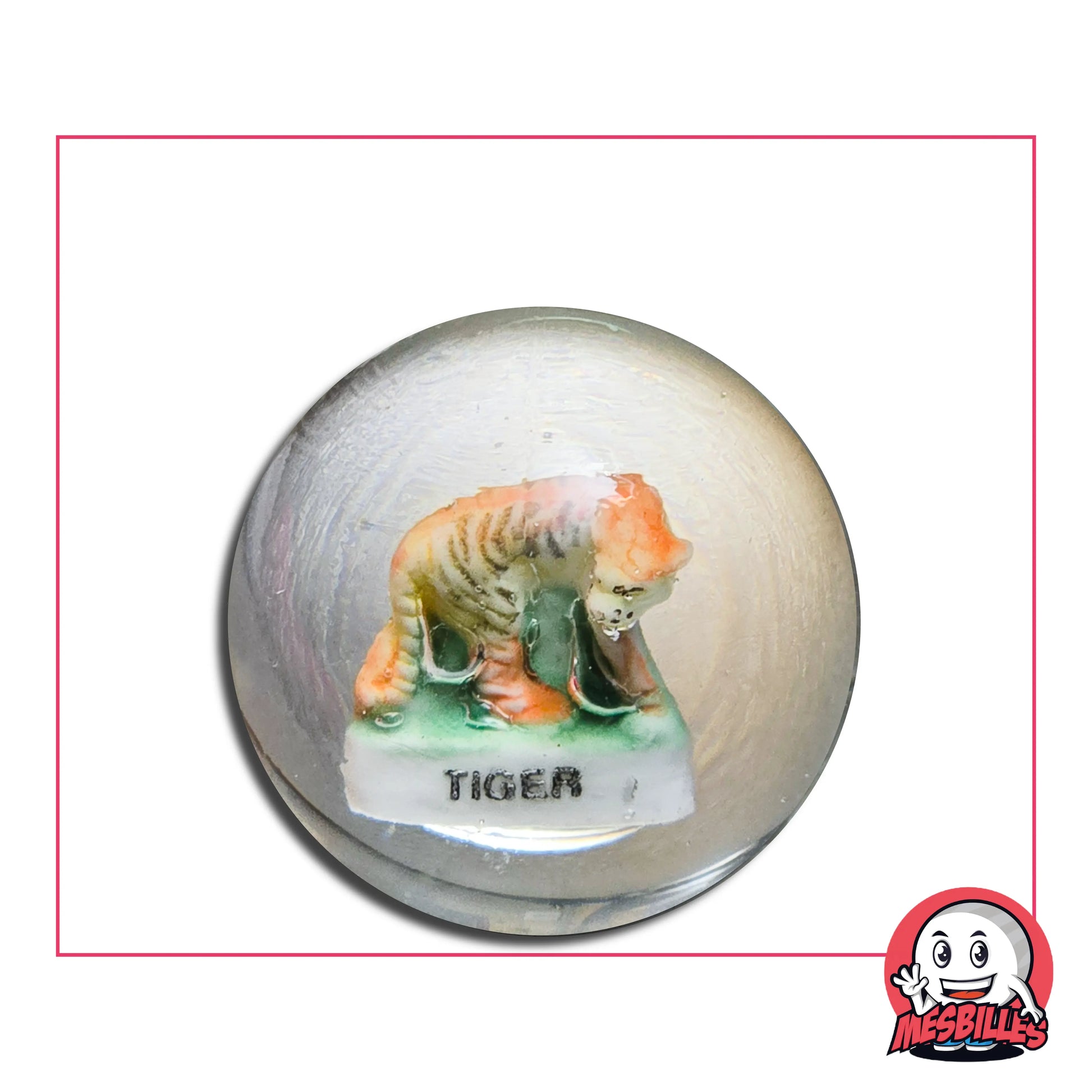 Un tigre en porcelaine trône dans cette bille de 35 mm, prêt à bondir… enfin, presque !