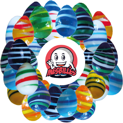 Image of the Mascot My-Glassmarbles surrounded by Marbles Egg My-Glassmarbles, unusual shape, translucent night-blue glass with green and white stripes, 25mmMarbles Egg My-Glassmarbles, unusual shape, translucent night-blue glass with green and white stripes, 25mm