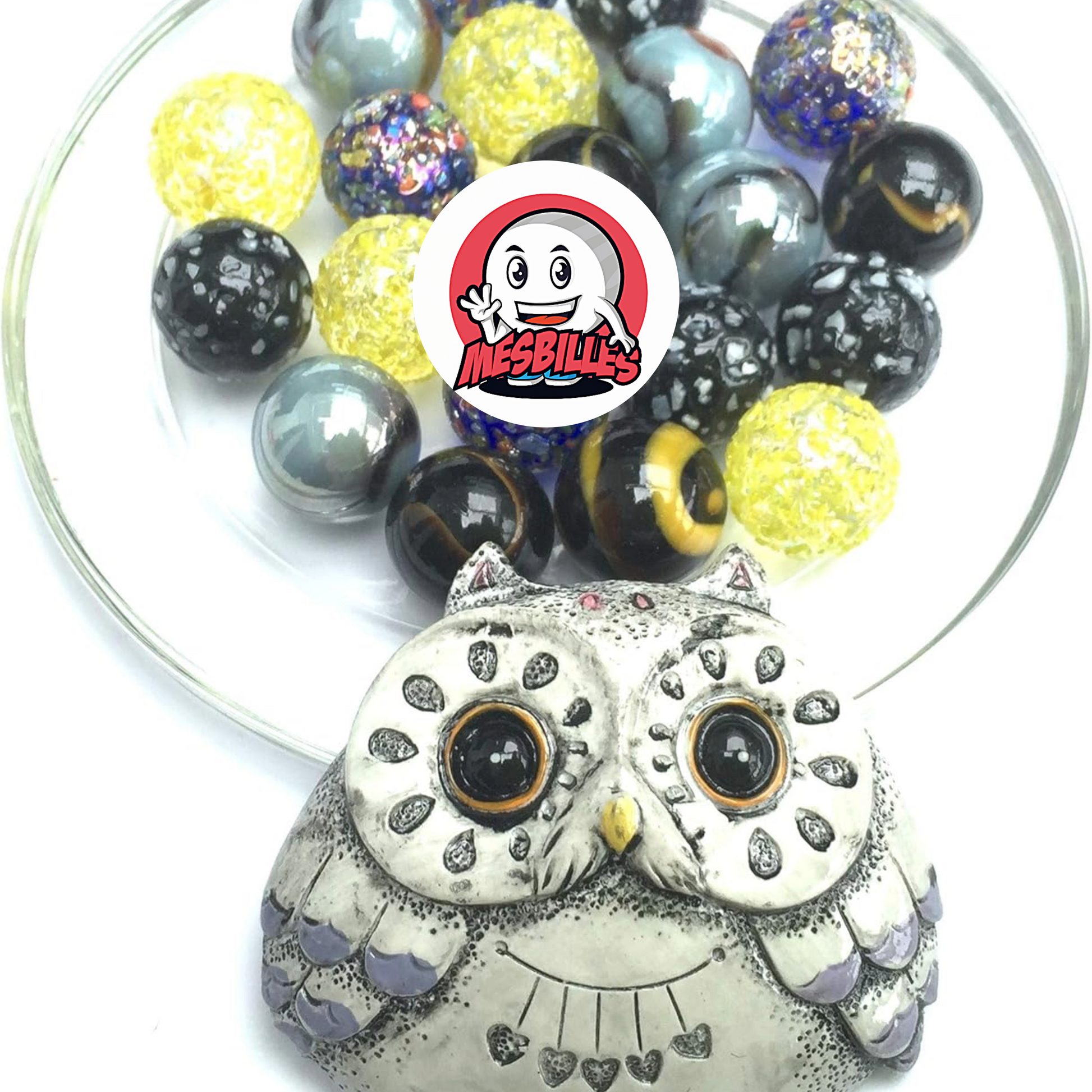 A round grey owl, 20 brilliant glass marbles - My-Glassmarbles