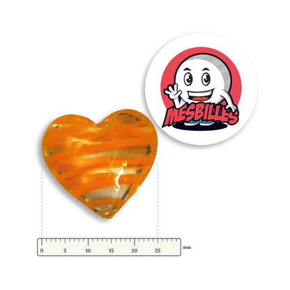 Bille Coeur Cristal Rayée Orange à côté d'une règle graduée, environ 25 mm de large